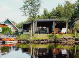 Luxus Chalet Schlaffass und Tinyhouse am See angeln Boot SUP Spa mit Sauna und Jacuzzi, Hotel in Twist