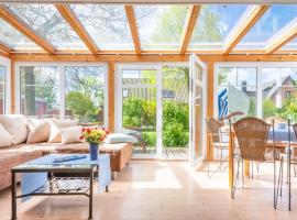Ostseegarten Langholz - Ferienwohnung Wintergarten bis 7 Pers, khách sạn ở Waabs