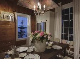 Storybook family cottage perched atop Penn Cove