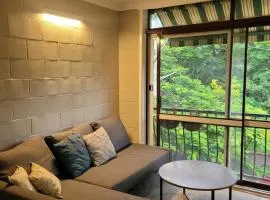 Breezy entire 2 bedroom unit top floor next to UQ