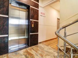 Super Townhouse Ecity Inn、バンガロールのホテル