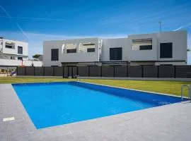 AT308 Con piscina, aire acondicionado, parking, playa Canyadell a pocos metros