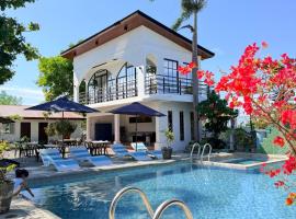 Villa de Flynn Private Resort, Hotel in Bauang