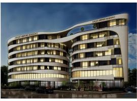 Almouj St 213 1BHK Liaqat Airport Residence, Hotel in Mawāliḩ
