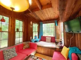 Cozy waterfront cabin with fire pit