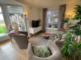 Gezellige vakantiewoning aan het water in Ewijk - recreational only no workers, hotel a Ewijk