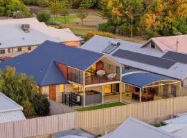 Sandy Toes and Sunsets Beach House