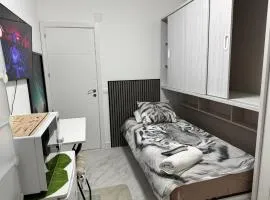 Habitacion con baño compartido