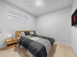 Simple and Stylish 1BR Basement Suite Near U of A