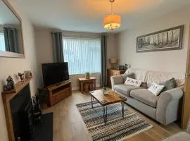 Two bedroom house with enclosed gardens and 2 car drive