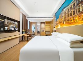 维也纳国际酒店海口高铁东站吾悦广场店, hotel a Toupucun