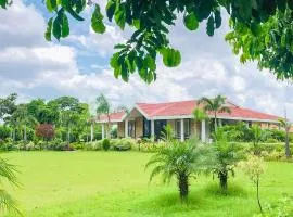 StayVista's The River Villa - Pet-Friendly Riverside Villa with Lawn & Bonfire