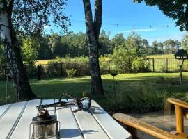 Flämingpanorama - Ländliches Gartenhaus mit Kamin und Naturpanorama, hotel sa Niedergörsdorf