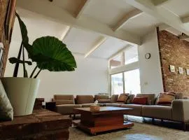 Valewood Mid-Century Haven with Playroom and Spa Tub