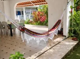 Chambre cosy en villa nichee dans un ecrin de verdure au centre de l ile