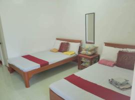 Mamita Seaside Resort، فندق في Guinisiliban