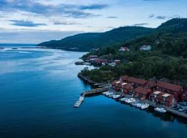 Direkt am Fjord: Cozy Ferienhaus in Bergkulisse