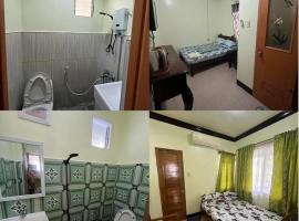 Balai Mariacaria Pension House, Hotel in Guindulman