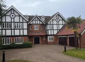 Luxury 6 Bed Mansion with Cinema, Gardens & Gated Estate