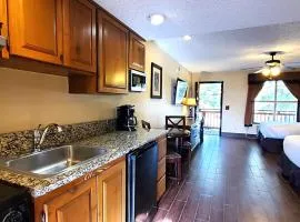 Deluxe Suite with Kitchenette and Balcony, Steps to Rodeo and Pool! 253