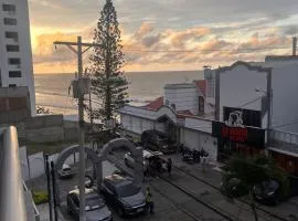 Stylish coastal retreat steps from the beach