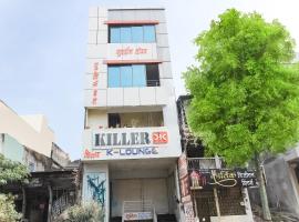 Hotel O Unique Inn، فندق في Dhule
