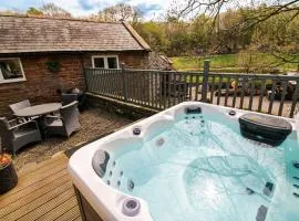Mill House Cottage, on a Fishing Park near Brampton with hot tub