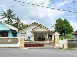 Puri Palm Homestay, hótel í Soprayan