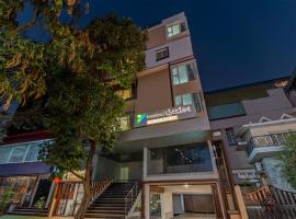 Treebo Cocoon Suites, хотел в Бангалор