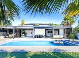 Villa à 400 m de la plage, piscine chauffée