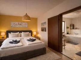 Ferienhaus ,,Pier 7" am See - 2 Wohnungen mit Garten für bis zu 11 Personen, einzeln oder zusammen buchbar