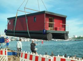 Hausboot Kaddi`s Sunflower - Huus & Meer, hôtel à Fehmarn