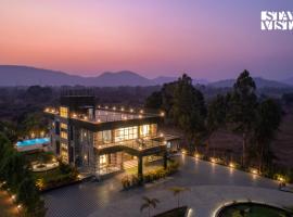 StayVista at Ashbourne Estate with AC, BBQ, Bonfire, Hotel in Wada