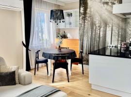 Apartament La Bella klimatyzacja, garaż podziemny, Fv、スヴァウキのホテル