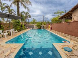 Casa com Piscina a 400m da Praia de Boraceia, hotel Boracéiában