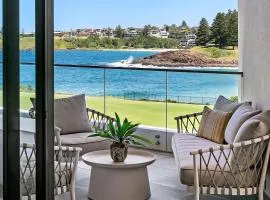 3BR Coastal Escape with Ocean Views, Shared Pool & Jacuzzi, 2 Car Spaces & Walk to Surf Beach