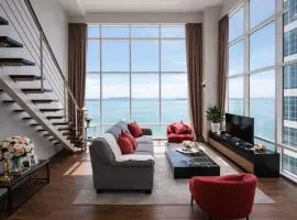High floor Seaview 2BR Loft Maritime Suites Goerge Town Karpal Singh