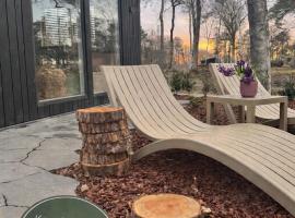 Sfeervol huis met privétuin en hottub aan bosrand Boshuisje Nero, hotell sihtkohas Haarle