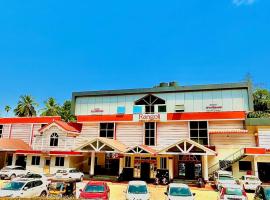 Rangoli Suites & Restrobar โรงแรมในBantvāl