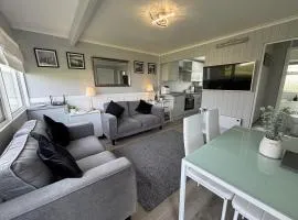 169 - Two bed Chalet on Sunbeach Holiday Park - Sleeps 5, pet friendly, FREE pool and entertainment passes included - plus WiFi, bed linen and towels included 300m from the beach!