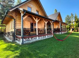 Borowikowe Zacisze drewniane domy z kominkami, hotell i Falsztyn