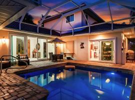 Villa Hibiscus-Waterfront-Free Heated Pool-Dock-Bikes-Other Amenities, מלון בפונטה גורדה