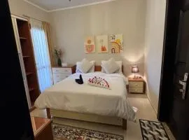 Sahl Hasheesh Finest Chalet - Gravity resort beachfront family 2 bedroom - garden pools view waterpark NON EGYPTIAN ONLY