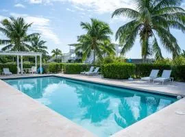 Lux Condo w/Views, Htd Pool, Priv. Beach, Golf Cart, Kayaks, AS SEEN ON HGTV