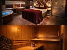 Wellness Tuin - Boudoir Suite - Ultieme Partner Beleving - Indoor Jacuzzi en Openhaard en privé Sauna - in Romantische stijl - Gratis Fles Prosecco & Leuke Partner connect box !