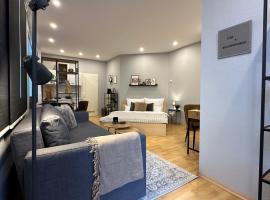 BELLAHOMES Apartments, Ground Floor, Aircondition, Private Parking, Airport 30 min, Hotel in Erlensee