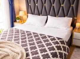 Serengeti Studio Apartments with Netflix, Ac, Wi-Fi, close to the Airport, Hotel in Kampala
