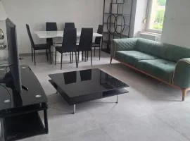 Appartement neuf avec terrasse et jardin