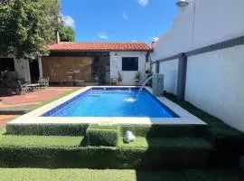 Casa con Piscina y Quincho a 8 min del aeropuerto