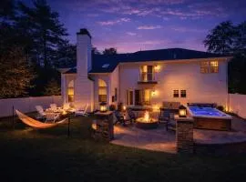 Luxury Villa with Hot Tub, Two Fire Pits, King Bed Suite, Game Room & Fenced Yard